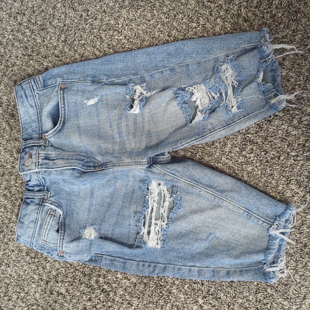 Light blue ripped jean shorts.